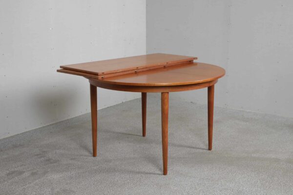 Rundt spisebord i teak med to tillægsplader, Skovmand Andersen