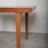 Stort spisebord i teak, én tillægsplade