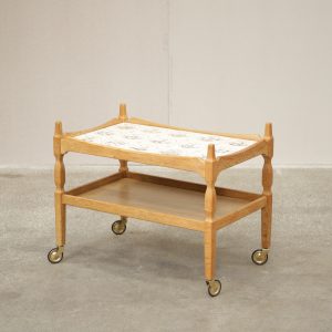Mid-century modern serving cart with tile top for kitchen and dining.