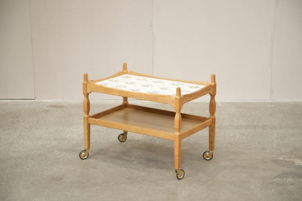 Mid-century modern serving cart with tile top for kitchen and dining.