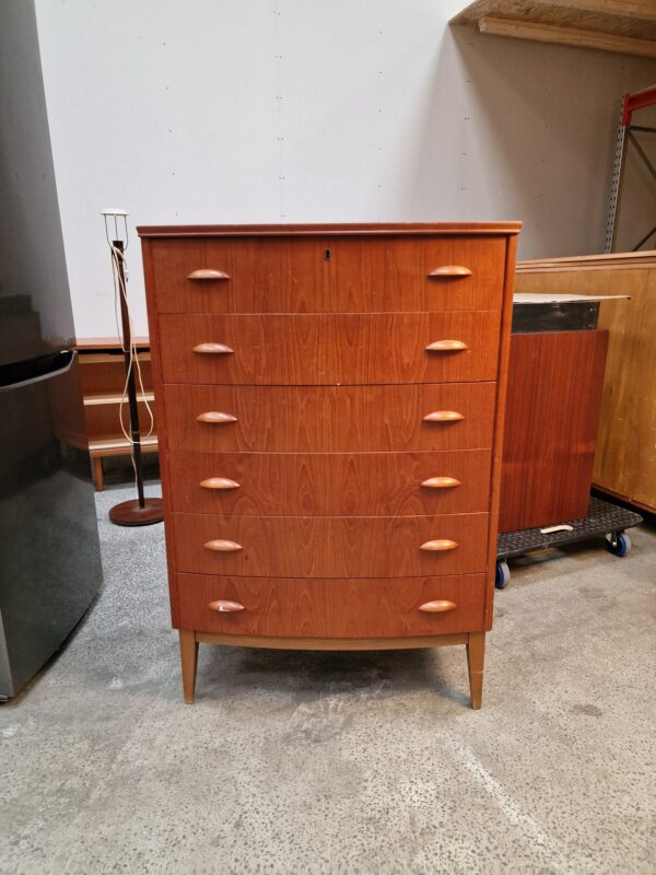 Mid-century modern teak chest of drawers.