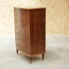 Vintage curved walnut chest of drawers.