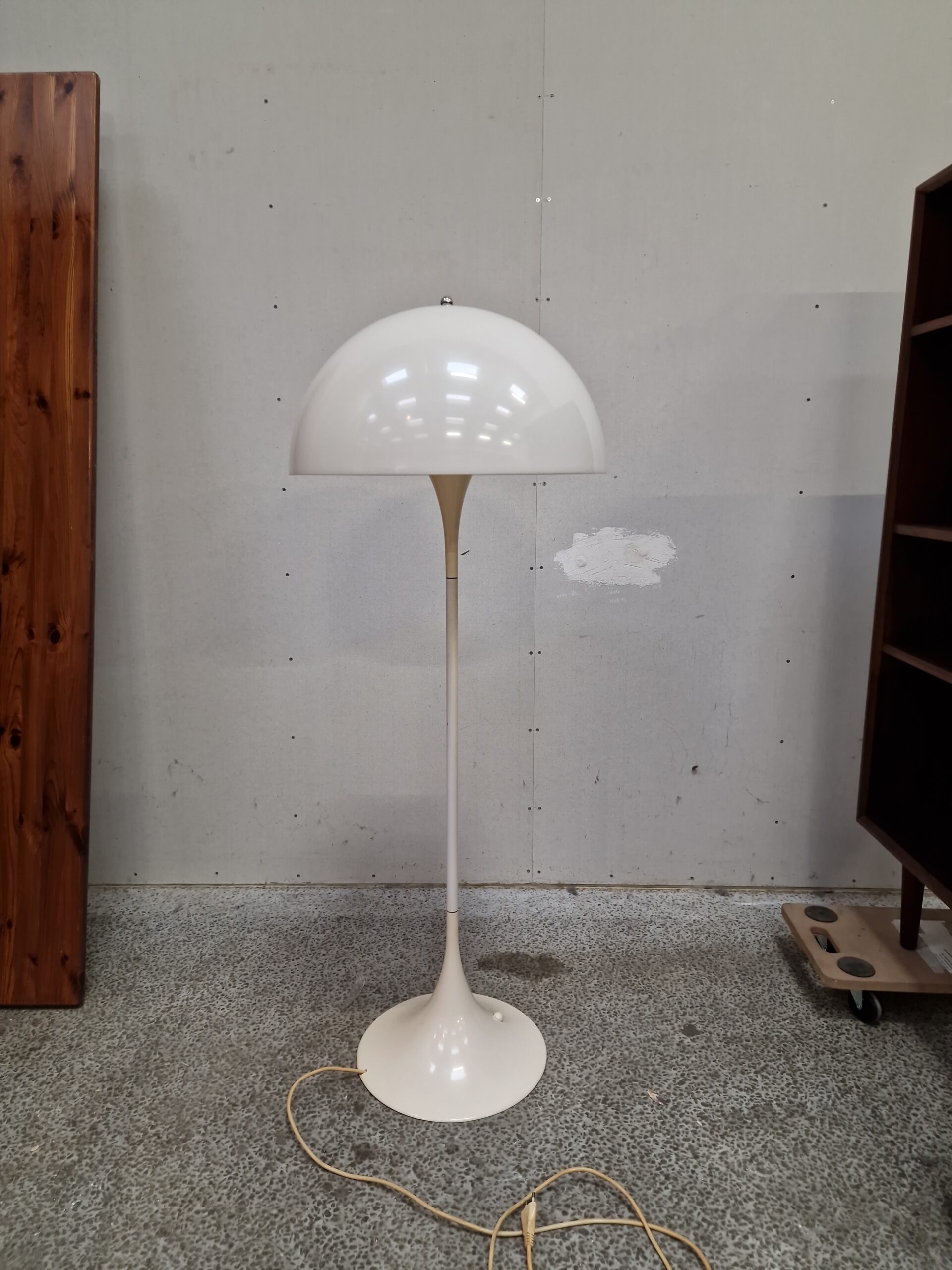 Mid-century modern white dome floor lamp.