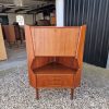 Vintage teak corner cabinet with drawers.