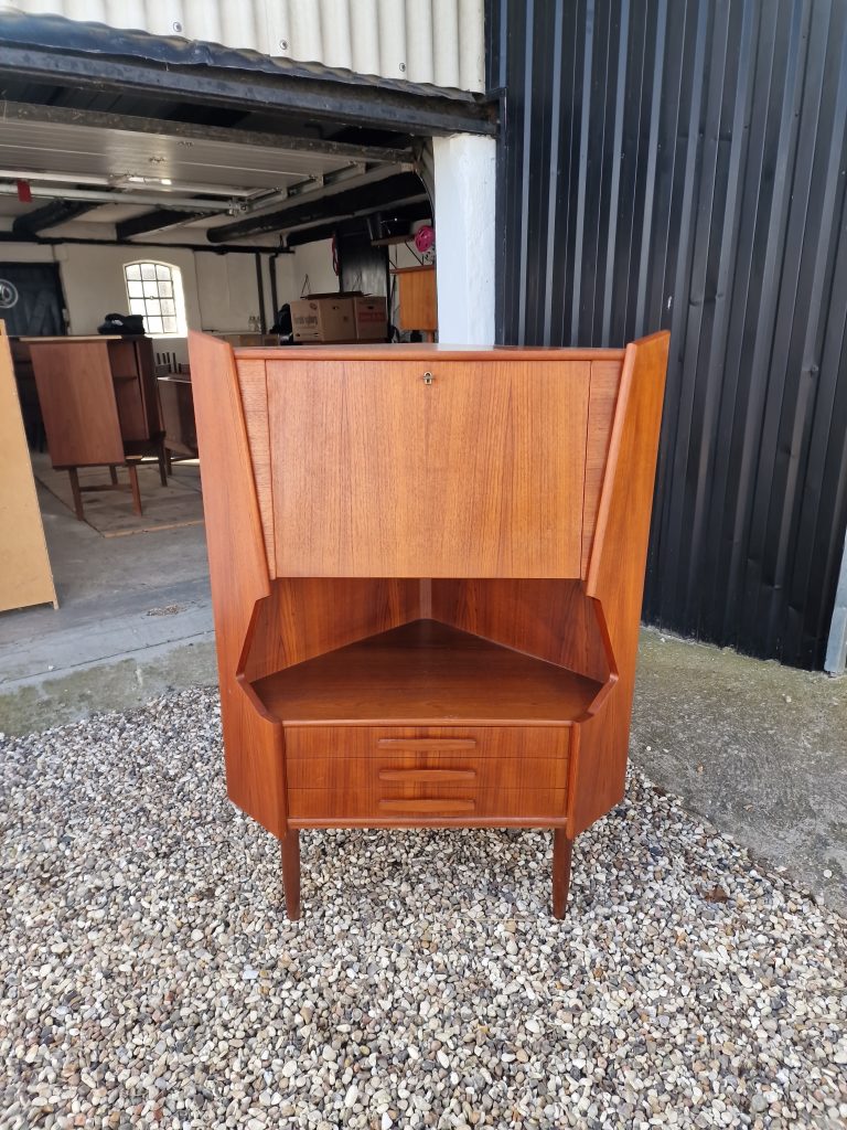 Vintage teak corner cabinet with drawers.