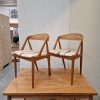 To spisestole i teak, Kai Kristiansen model 31, til ompolstring